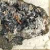 Meneghinite
